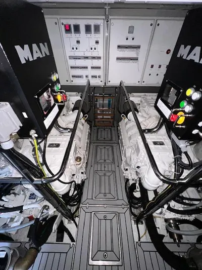  Yacht Photos Pics Engine room of 2016 Prestige 750 yacht with MAN engines and control panels.