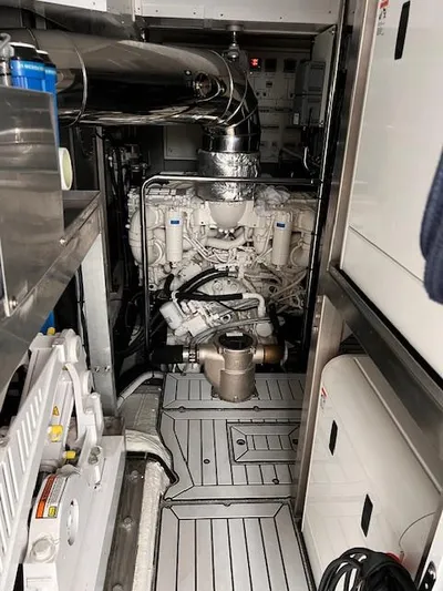  Yacht Photos Pics Engine room of a 2016 Prestige 750 yacht, showcasing machinery and components.