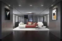Luxurious modern living room with sleek furniture, artistic decor, and ambient lighting, Tureddi X370, 2027.