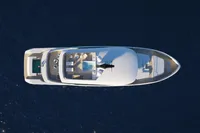 Aerial view of 2027 Tureddi X370 luxury yacht on deep blue water.