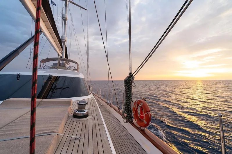  Yacht Photos Pics Custom 2012 Motorsailor yacht sailing at sunset on open sea.