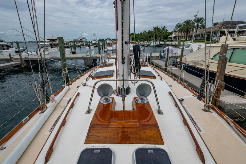 Ghost Yacht Photos Pics Hinckley Sou'wester Stoway Sloop 2000 docked at marina, showcasing deck and rigging.