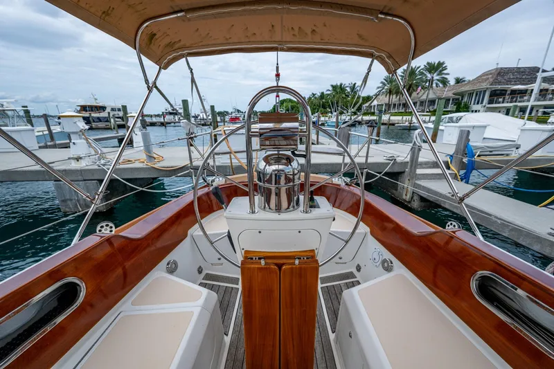Ghost Yacht Photos Pics Hinckley Sou'wester Stoway Sloop 2000 cockpit with wooden accents at marina.