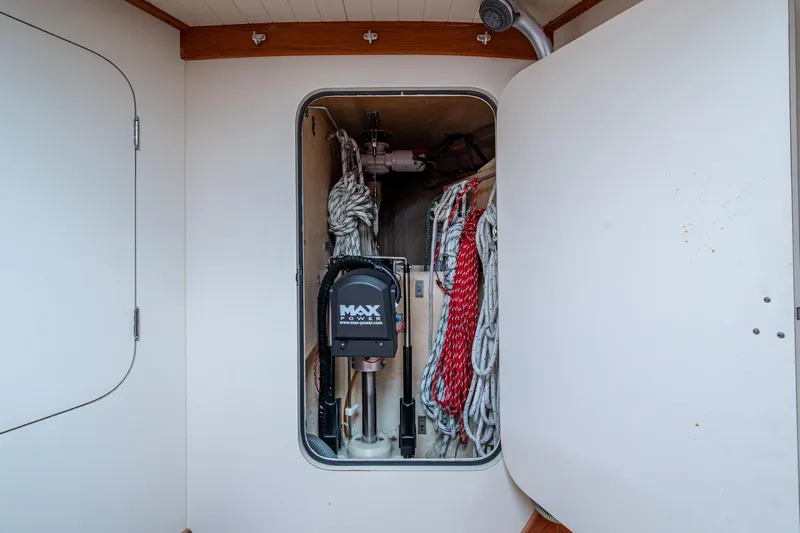 Ghost Yacht Photos Pics Storage compartment on 2000 Hinckley Sou'wester Stoway Sloop with ropes and equipment.