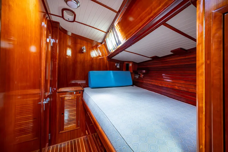 Ghost Yacht Photos Pics Luxurious wooden cabin interior of 2000 Hinckley Sou'wester Stoway Sloop yacht.