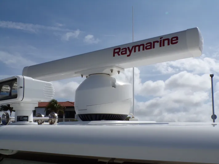  Yacht Photos Pics Raymarine radar on 2018 Boston Whaler 420 under blue sky.