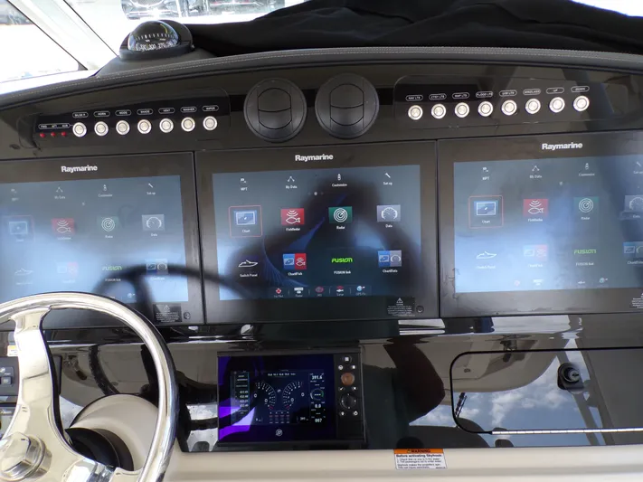  Yacht Photos Pics 2018 Boston Whaler 420 dashboard with Raymarine displays.