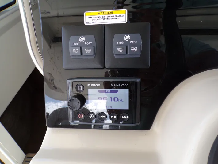  Yacht Photos Pics Boston Whaler 420 control panel with Fusion MS-NRX300 radio.