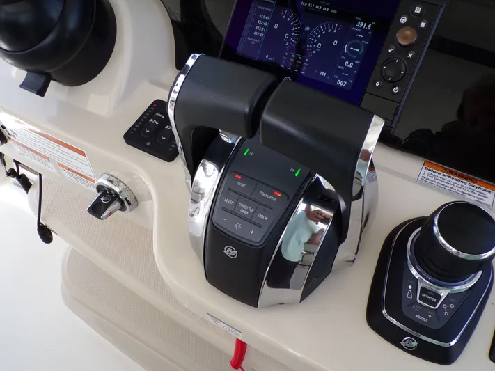  Yacht Photos Pics Control console of a 2018 Boston Whaler 420 with controls.