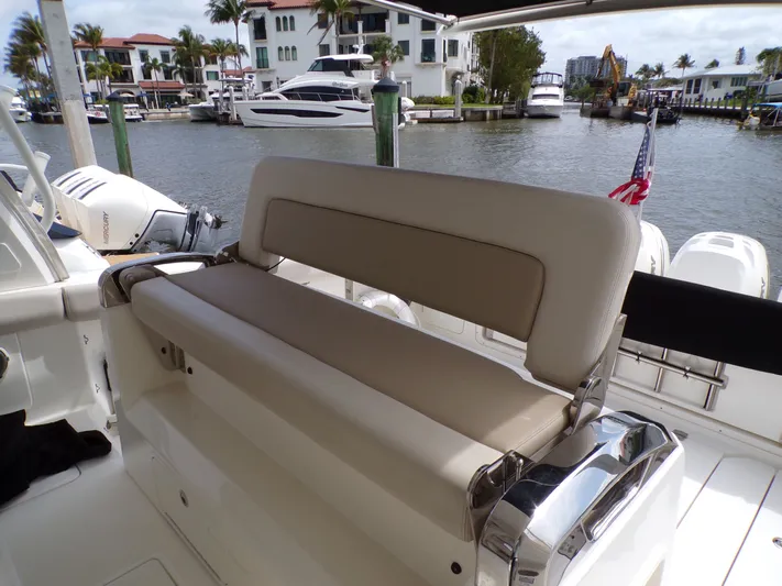  Yacht Photos Pics 2018 Boston Whaler 420 boat with luxurious seating by the waterfront.