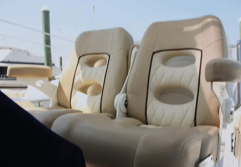  Yacht Photos Pics 2018 Sea Fox 288 Commander boat seats, beige leather upholstery, docked in marina.