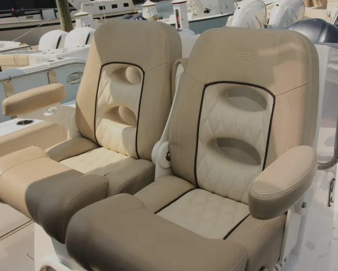  Yacht Photos Pics 2018 Sea Fox 288 Commander boat seats, beige leather, diamond stitching, armrests, docked at marina.