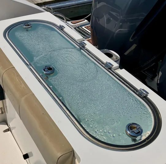  Yacht Photos Pics Livewell on a 2018 Sea Fox 288 Commander boat, featuring a transparent lid with condensation.