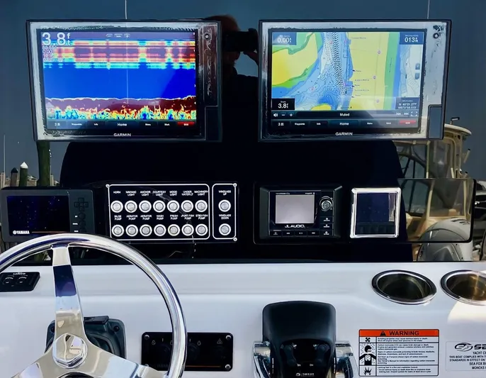  Yacht Photos Pics Control panel of 2018 Sea Fox 288 Commander with Garmin displays and navigation equipment.