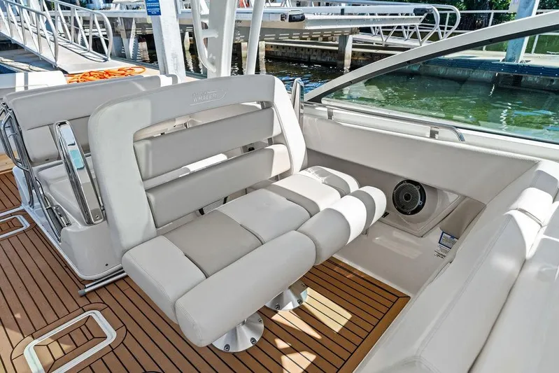 Marmara Yacht Photos Pics 2020 Boston Whaler 320 Vantage interior with luxurious seating and teak flooring.