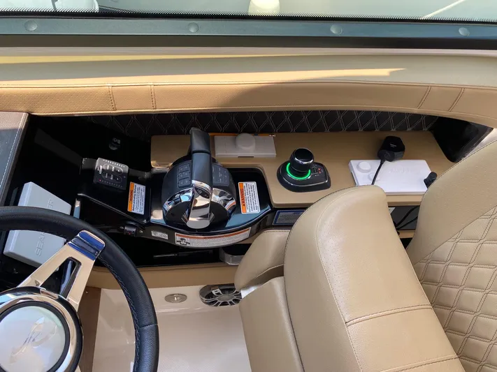 2021 Sea Ray 400 Slx Ob Yacht Photos Pics 2021 Sea Ray SLX 400 Outboard helm with modern controls and luxurious seating.