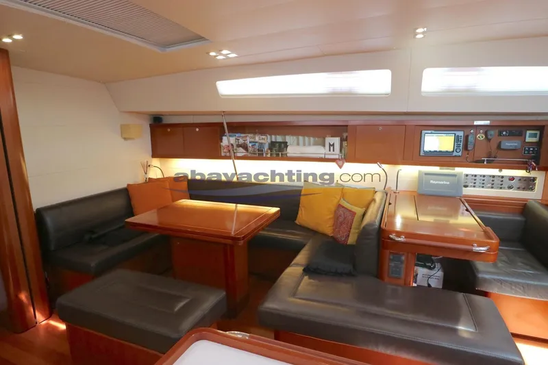  Yacht Photos Pics Interior of 2010 Beneteau Oceanis 58 yacht with modern seating and navigation equipment.