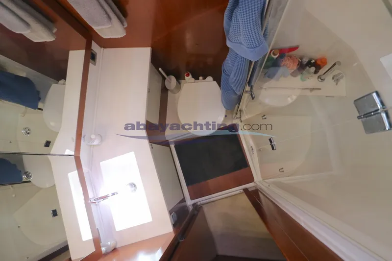  Yacht Photos Pics Bathroom interior of 2010 Beneteau Oceanis 58 yacht with modern fixtures.