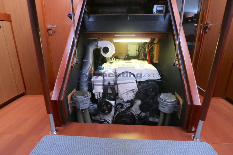  Yacht Photos Pics Engine room of 2010 Beneteau Oceanis 58 yacht, showcasing mechanical components and interior design.