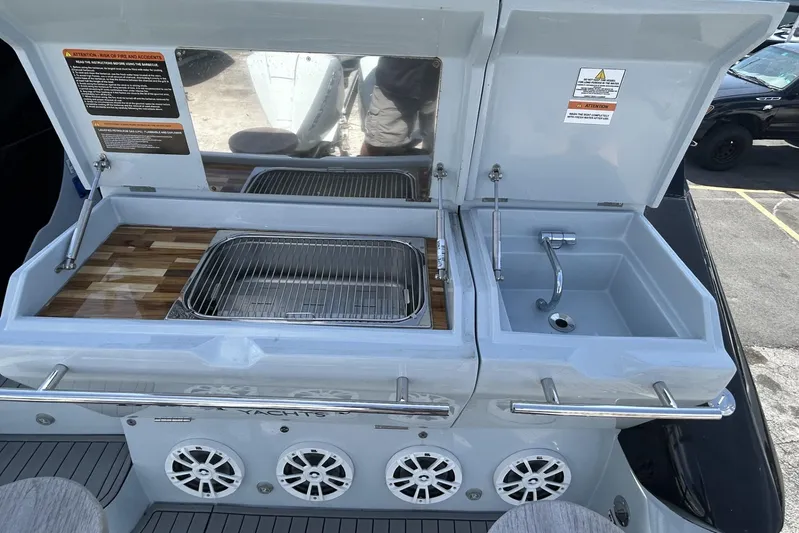  Yacht Photos Pics Outdoor kitchen setup on L'ACQUA LR350 yacht, featuring grill and sink, 2025 model.
