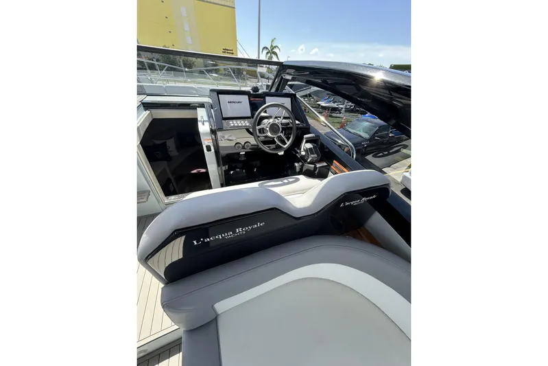  Yacht Photos Pics Interior view of 2025 L'ACQUA LR350 yacht cockpit with modern steering and controls.