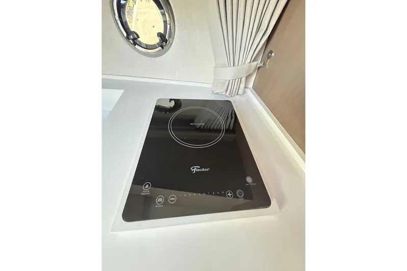  Yacht Photos Pics Modern L'ACQUA LR350 induction cooktop, 2025 model, in sleek kitchen setting.