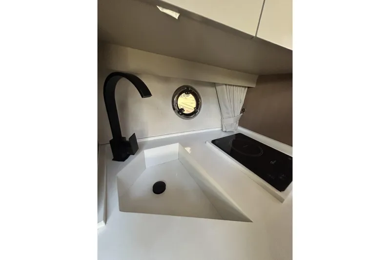  Yacht Photos Pics Modern L'ACQUA LR350 kitchen with sleek sink, faucet, and induction cooktop, 2025 model.