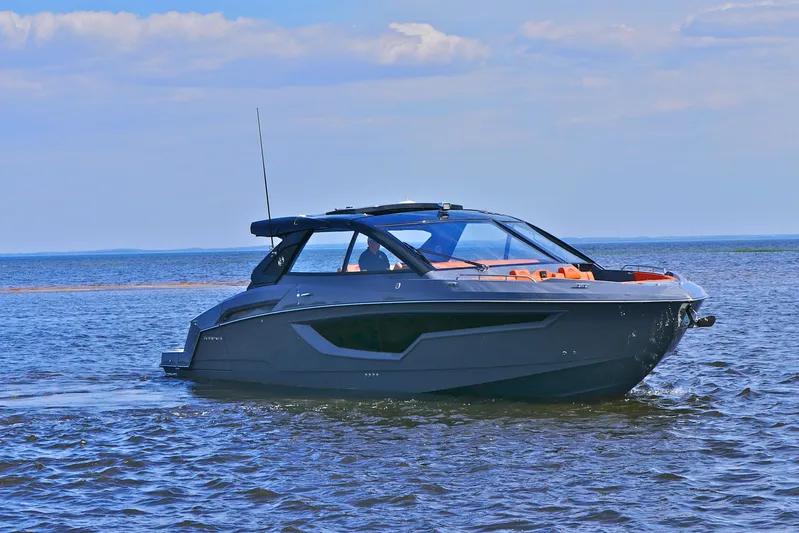  Yacht Photos Pics 2026 Cruisers Yachts 42 GLS I/O on open water under a blue sky.