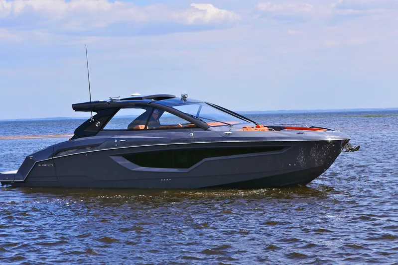  Yacht Photos Pics 2026 Cruisers Yachts 42 GLS I/O luxury boat cruising on open water.