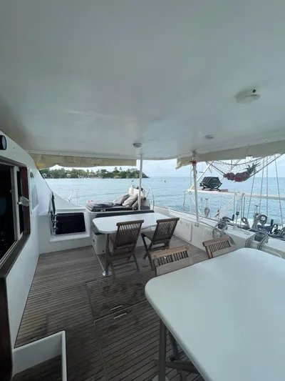  Yacht Photos Pics Spacious deck of 2005 Lagoon 570 Switch yacht with ocean view.