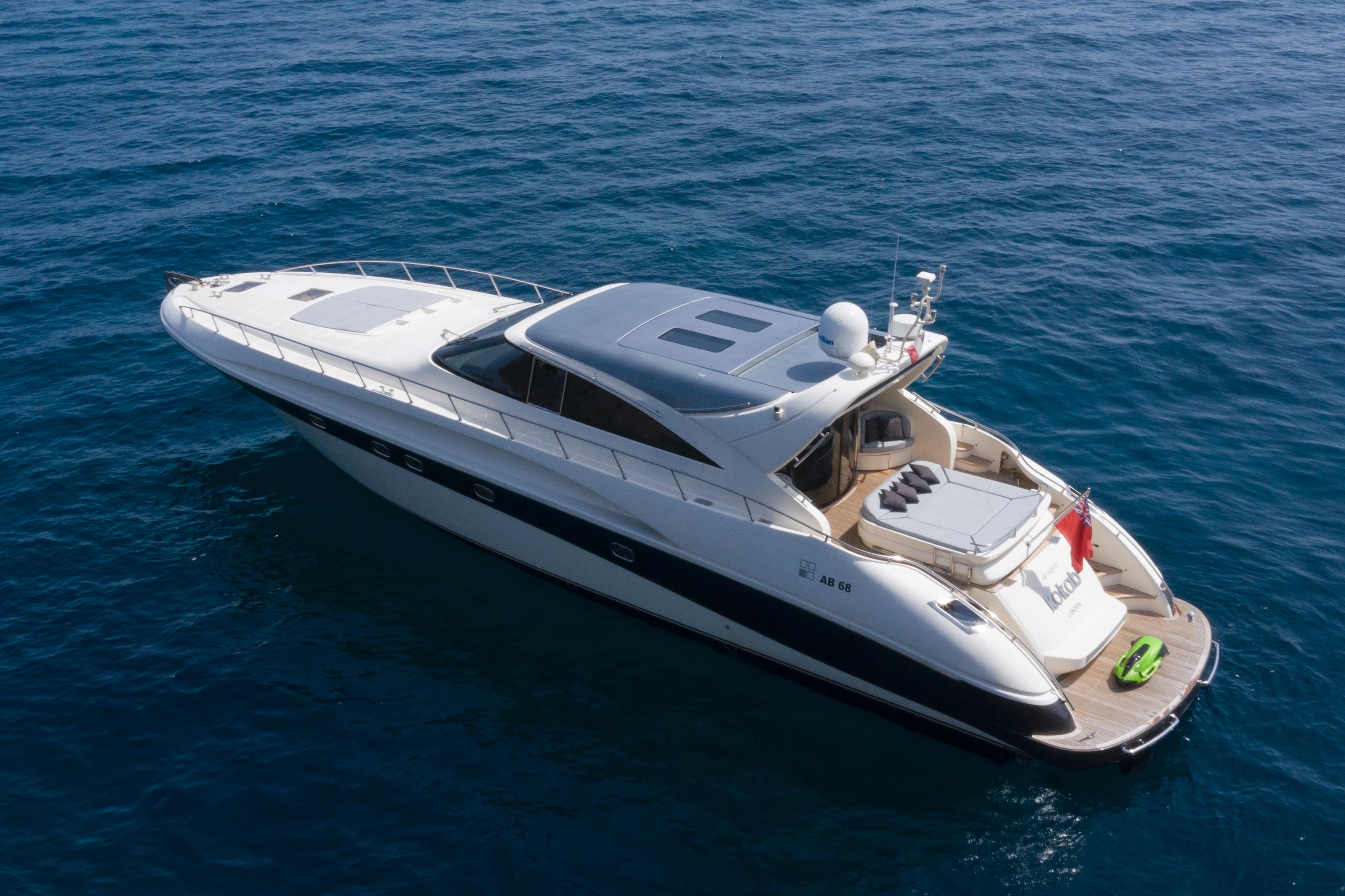 Luxury AB Yachts 68 from 2003 cruising on open sea.