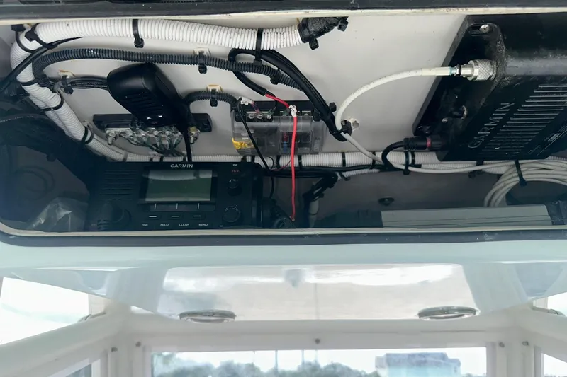 Cat Gone Willd Yacht Photos Pics 2023 Twin Vee 340 GFX CC boat electronics, featuring Garmin equipment and wiring setup.