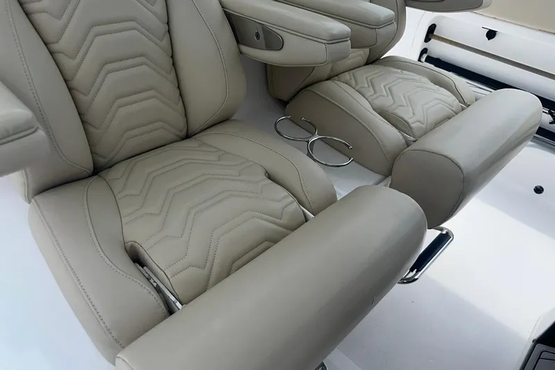 Cat Gone Willd Yacht Photos Pics Luxurious beige seating in 2023 Twin Vee 340 GFX CC boat interior.