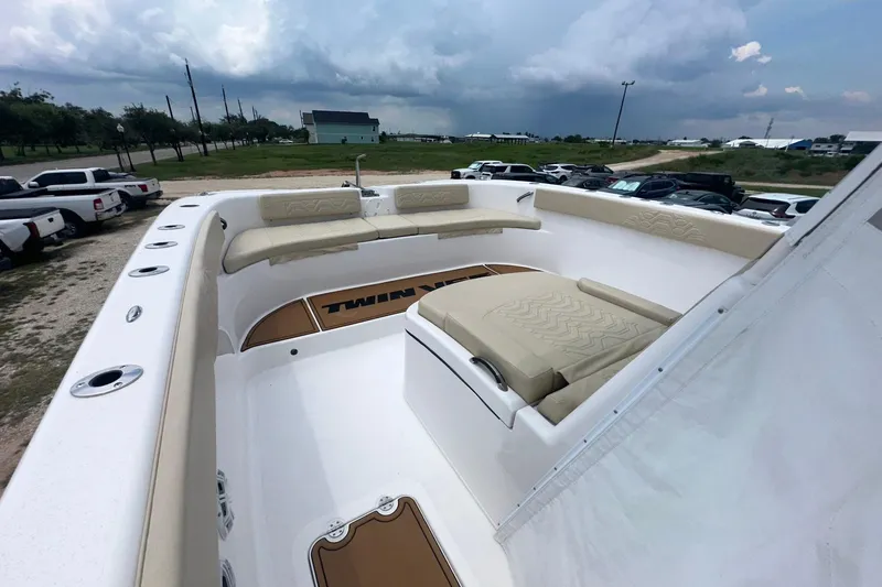 Cat Gone Willd Yacht Photos Pics 2023 Twin Vee 340 GFX CC boat with spacious seating and sleek design.