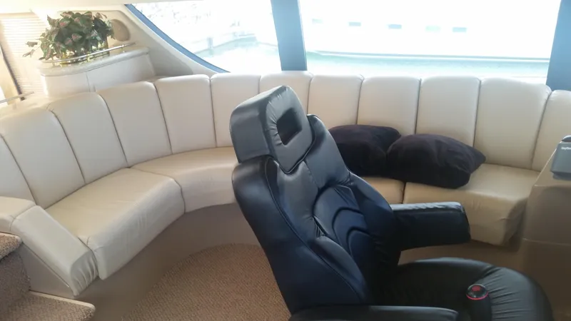 Trades Welcome Yacht Photos Pics Luxurious interior of 1999 Carver 530 Voyager Pilothouse with leather seating.