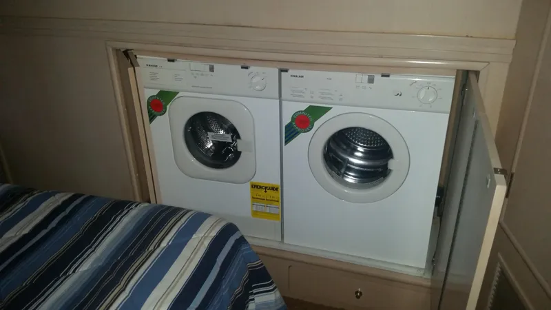 Trades Welcome Yacht Photos Pics Built-in washer and dryer in 1999 Carver 530 Voyager Pilothouse yacht.