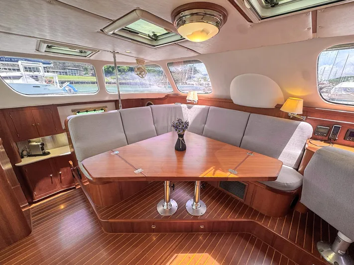 Adventure Yacht Photos Pics Luxurious Antares 44i yacht interior with elegant wood finish and cozy seating, 2013 model.