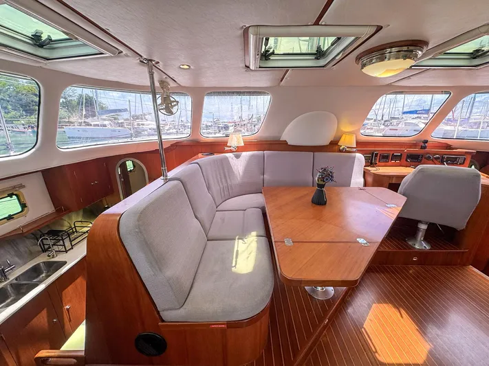 Adventure Yacht Photos Pics Luxurious 2013 Antares 44i yacht interior with elegant wood finish and spacious seating area.