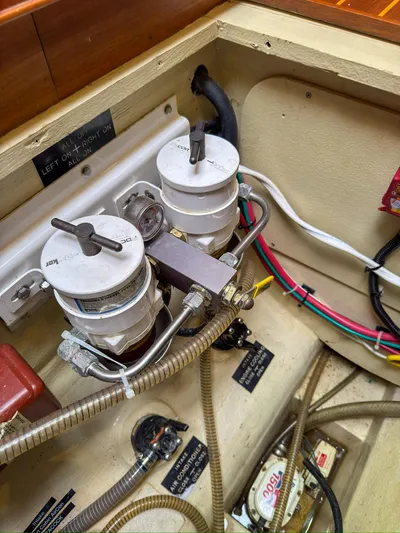 Adventure Yacht Photos Pics Engine compartment of 2013 Antares 44i with dual fuel filters and wiring.