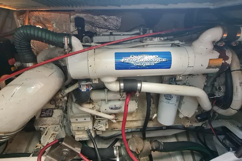  Yacht Photos Pics Engine compartment of a 1998 Formula 41 Performance Cruiser, featuring a Diamond Performance Series engine.