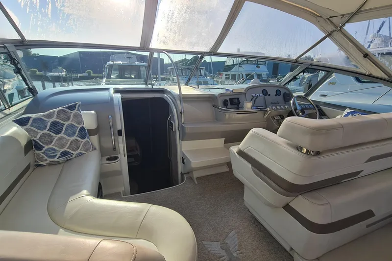  Yacht Photos Pics 1998 Formula 41 Performance Cruiser interior with plush seating and modern dashboard.