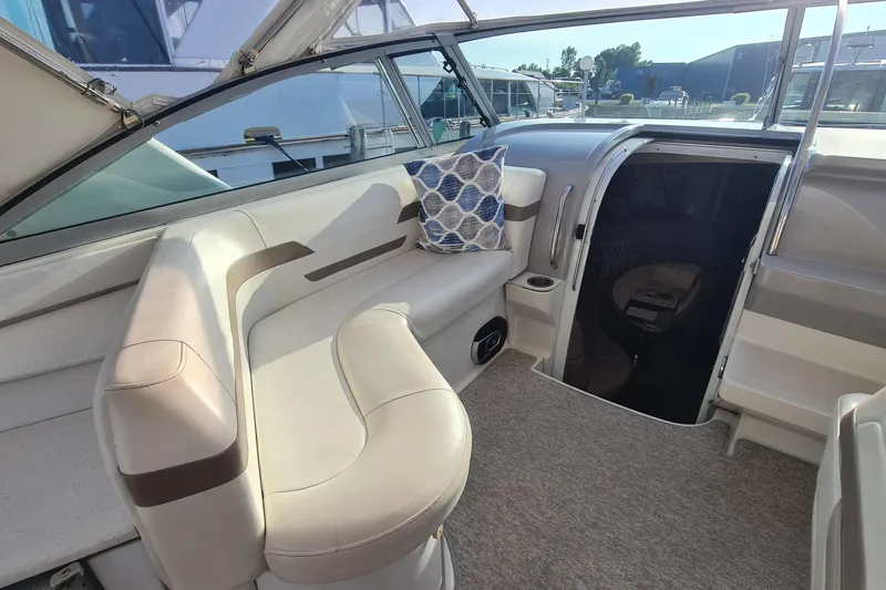  Yacht Photos Pics Interior of a 1998 Formula 41 Performance Cruiser with plush seating and decorative pillow.