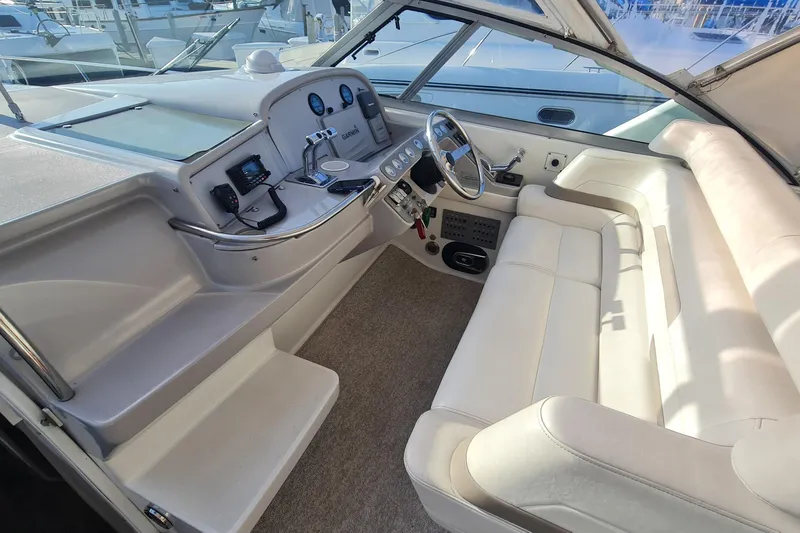  Yacht Photos Pics 1998 Formula 41 Performance Cruiser cockpit with white seating and modern controls.