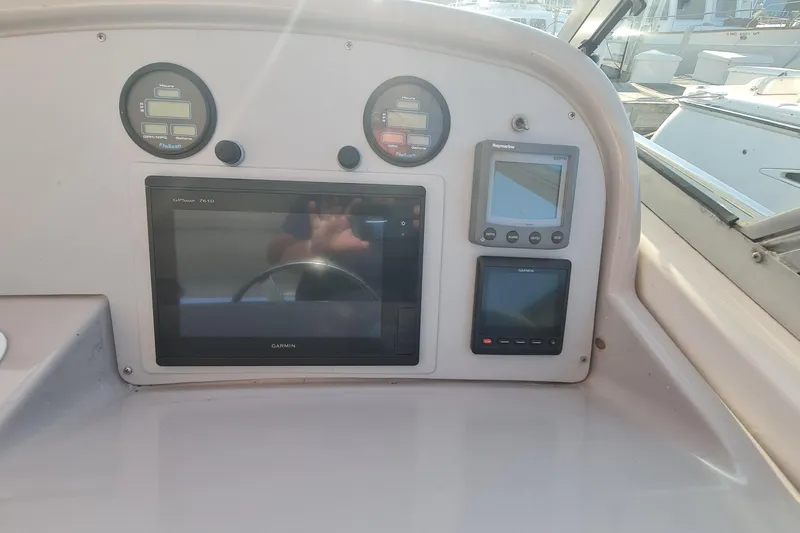  Yacht Photos Pics 1998 Formula 41 Performance Cruiser dashboard with Garmin GPS and control gauges.