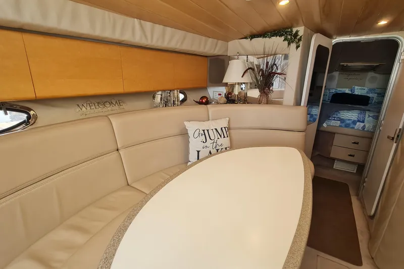  Yacht Photos Pics Interior of 1998 Formula 41 Performance Cruiser with cozy seating and elegant decor.