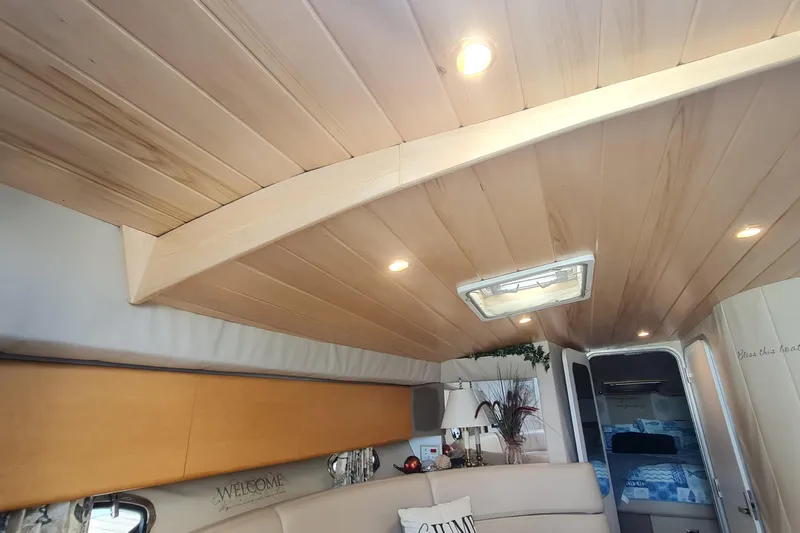  Yacht Photos Pics Interior of 1998 Formula 41 Performance Cruiser with wood ceiling and cozy decor.