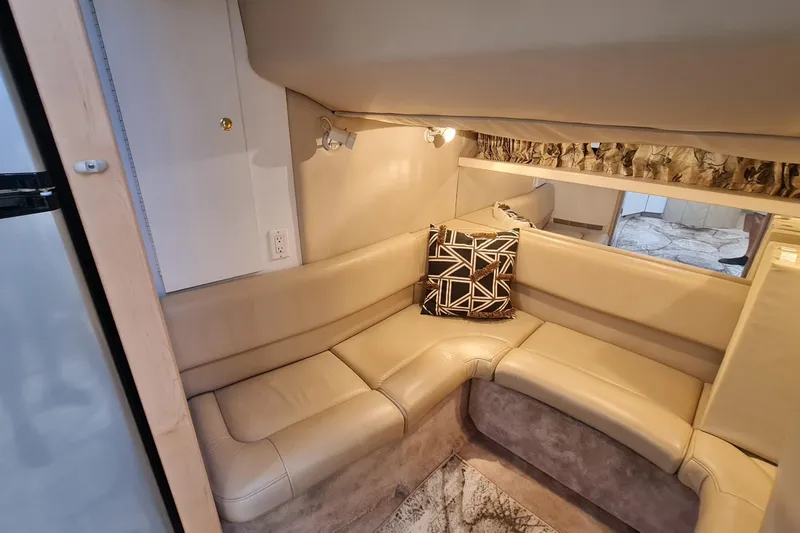  Yacht Photos Pics Interior of 1998 Formula 41 Performance Cruiser with beige leather seating and geometric pillow.