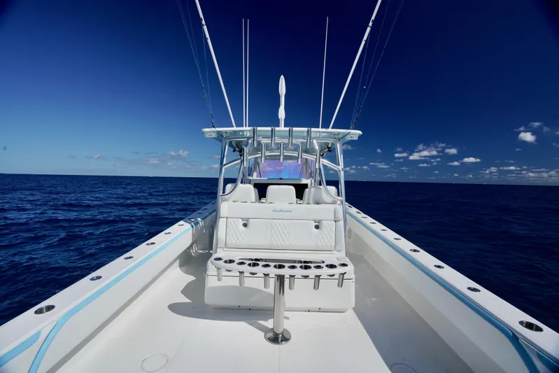  Yacht Photos Pics 2020 SeaHunter 46 CTS boat on open ocean, clear blue sky.