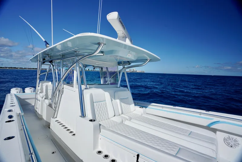 Yacht Photos Pics 2020 SeaHunter 46 CTS boat on open ocean under clear blue sky.