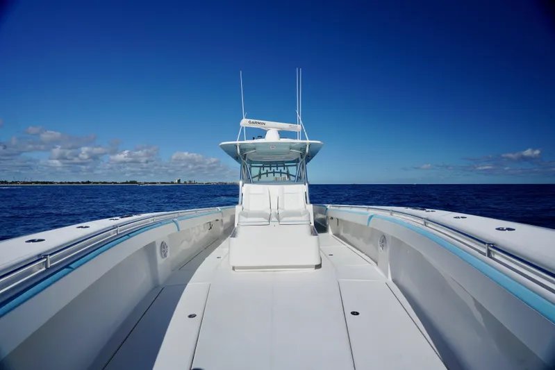  Yacht Photos Pics 2020 SeaHunter 46 CTS boat on open ocean under clear blue sky.